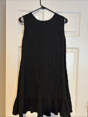 Black Sleeveless Ruffle-Hem Mini Dress